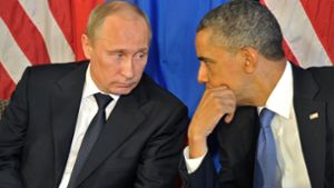 US-Präsident Obama spricht mit Russlands Präsident Putin. Foto: dpa/RIA Novosti POOL/EPA FILE
