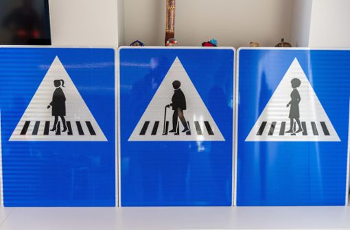 Neue Schilder braucht die Stadt ... und in Genf werden sie jetzt auch angebracht. Foto: dpa/Martial Trezzini