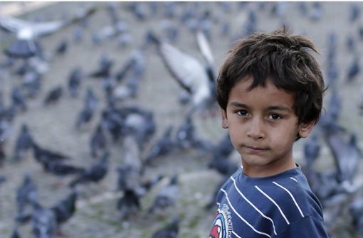 Ein Junge aus Syrien spielt in einem Park nahe eines Flüchtlingslagers in Istanbul. Das Foto stammt aus dem Jahr 2013. Foto: dpa