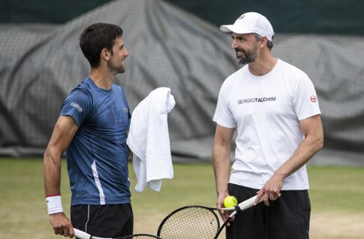 Novak Djokovic (links) und Goran Ivanisevic sind beide positiv auf Corona getestet worden. Foto: dpa/Peter Klaunzer