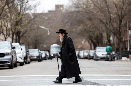 Ein Großteil der Erkrankten sind orthodoxe Juden, die aus religiösen Gründen die Impfung ablehnen. Foto: AFP