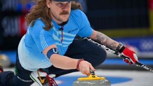 Matt Hamilton   nutzt Curling und seine Popularität, um im Kampf gegen Krebs Gutes zu tun. Foto: AFP/Lillian Suwanrumpha