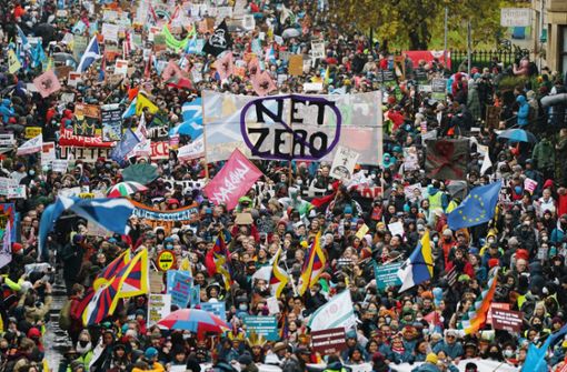 Demonstranten in Glasgow fordern mehr Klimagerechtigkeit. Foto: dpa/Andrew Milligan