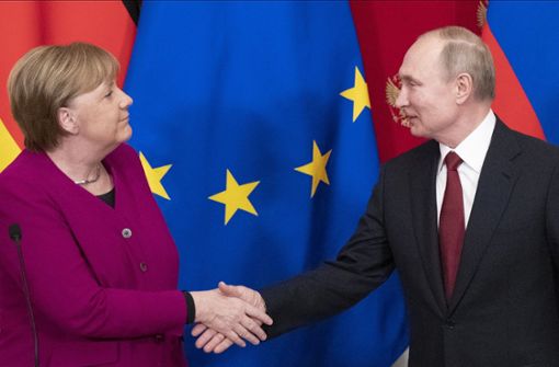 Bundeskanzlerin Angela Merkel beim Besuch in Moskau mit Präsident Putin Foto: dpa/Pavel Golovkin