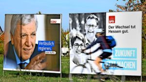 Verlässlichkeit gegen Wechselstimmung: die Wahlkampfplakate von Volker Bouffier und Thorsten Schäfer-Gümbel Foto: dpa