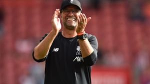 Glücklich in Liverpool: Jürgen Klopp hat seinen Vertrag verlängert. Foto: AFP/GLYN KIRK