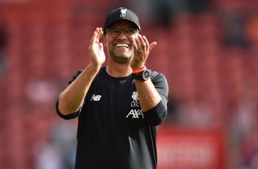 Glücklich in Liverpool: Jürgen Klopp hat seinen Vertrag verlängert. Foto: AFP/GLYN KIRK
