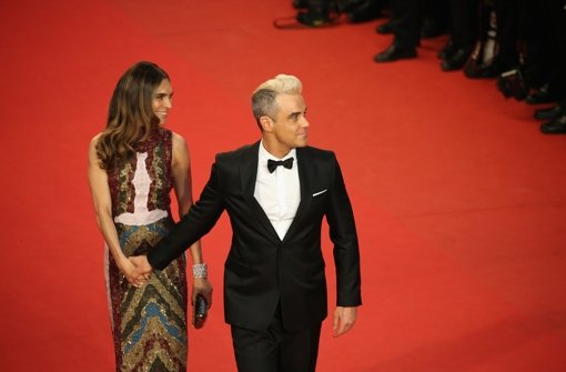Händchen halten in Cannes: Robbie Williams und Ayda Field Foto: Getty Images Europe