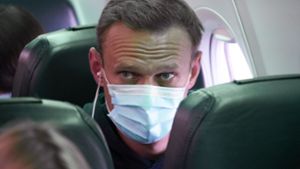 Kremlgegner Alexej Nawalny während seines Flugs nach Moskau. Foto: dpa/Mstyslav Chernov