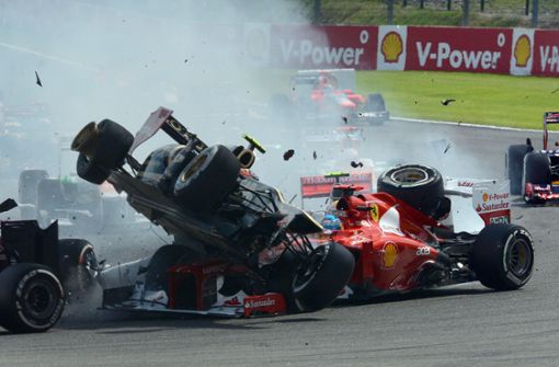 Der schwere Startunfall von Romain Grosjean (li.) und Fernando Alonso im Ferrari beim Großen Preis von Belgien 2012 hatte beim Franzosen eine Blockade ausgelöst. Foto: imago/Motorsport Images