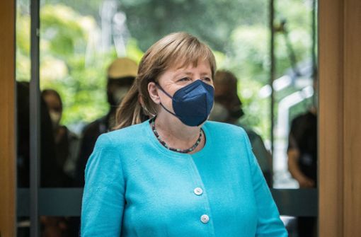 Angela Merkels wohl letzter Gang in die Bundespressekonferenz. Foto: AFP/STEFANIE LOOS