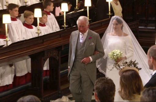 Eigentlich hätte Meghan Markles Vater Thomas seine Tochter bei der Hochzeit mit Prinz Harry im Mai 2018 zum Altar führen sollen. Da er nicht erschien, übernahm ihr Schwiegervater Prinz Charles den Job. Foto: dpa