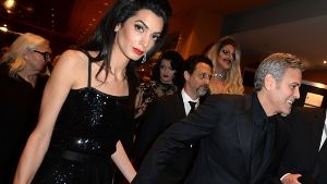 Hollywood-Star George Clooney und seine Frau Amal waren die Stars bei der Eröffnung der 66. Berlinale. Foto: dpa