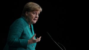 Angela Merkel spricht beim Tag der Deutschen Industrie in Berlin. Foto: Getty Images Europe