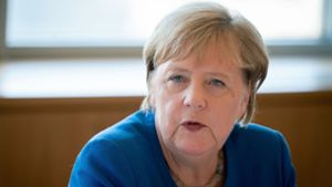 Die SPD knüpft die Weiterführung der großen Koalition an Kanzlerin Angela Merkel. Foto: dpa/Kay Nietfeld