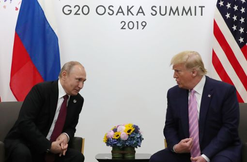 Russlands Staatschef Wladimir Putin (links) mit dem US-Präsidenten Donald Trump. Foto: AFP