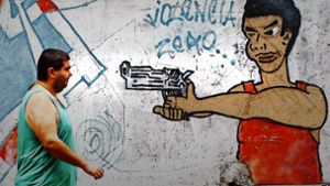 Im brasilianischen Alltag ist Kriminalität das beherrschende Thema – meist mit Waffeneinsatz. Foto: dpa/