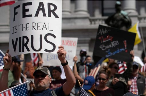 Die Verhaltensregeln zur Eindämmung des Virus in den USA, stoßen bei einem Teil der Bevölkerung auf Widerstand. Foto: AFP/JASON CONNOLLY
