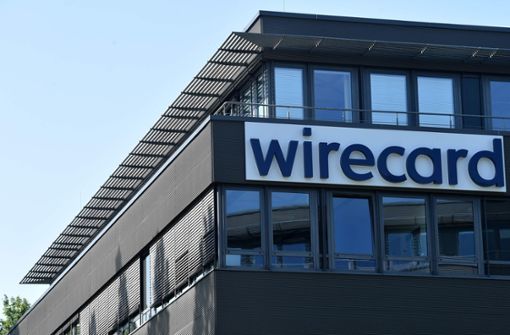 Der Schriftzug von Wirecard ist an der Firmenzentrale des Zahlungsdienstleisters zu sehen. Foto: AFP/CHRISTOF STACHE