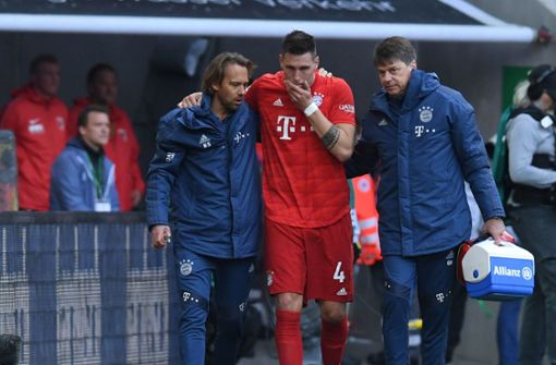 Bayern-Abwehrchef Niklas Süle ist wohl schwer verletzt, Foto: AFP/CHRISTOF STACHE