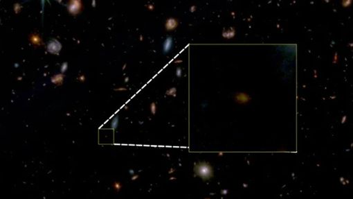 Das Falschfarbenbild des „James Webb“-Weltraumteleskops zeigt die Galaxie Jades-GS-Z7-01-QU (im Quadrat markiert als schwach leuchtender Punkt). Foto: Jaddes  Collaboration/dpa