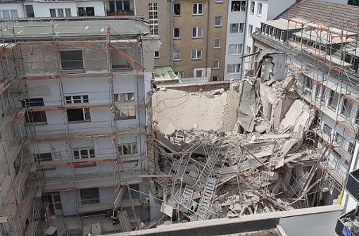 Zwei Bauarbeiter sind bei dem Hauseinsturz ums Leben gekommen. Foto: dpa/Gerhard Berger