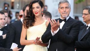 Das Promi-Paar George und Amal Clooney. Foto: AFP