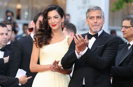Das Promi-Paar George und Amal Clooney. Foto: AFP