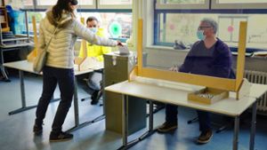 Eine Mannheimerin bei der Stimmabgabe zur Landtagswahl im März. Foto: picture alliance/dpa/Uwe Anspach