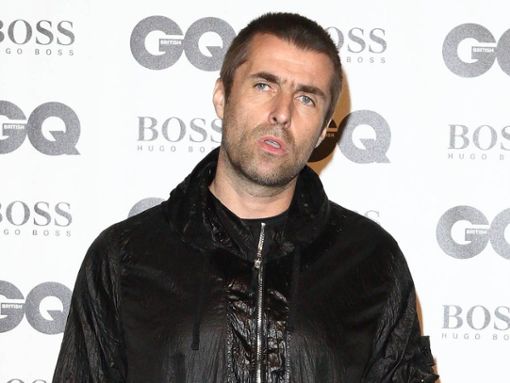 Liam Gallagher wartet auf eine bestimmte Geste seines Bruder Noel. Foto: Keith Mayhew/Landmark Media/ImageCollect
