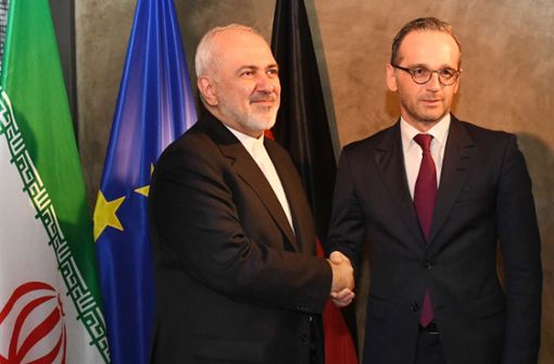 Irans Außenminister Dschawad Sarif (links) sucht in München den Schulterschluss mit seinem deutschen Amtskollegen Heiko Maas. Foto: dpa