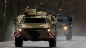 Bundeswehr-Fahrzeuge bei ihrer Ankunft in Litauen Foto: AFP/PETRAS MALUKAS