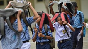 Vorbereitung für den Ernstfall: Schüler üben, wie sie auf einen Tsunami reagieren. Foto: AFP/MAHYUDDIN