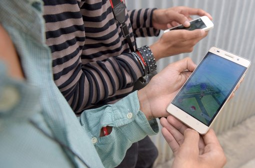 Pokémon-Go-daddeln ist in vielen Firmen tabu. Man fürchtet Foto: AFP