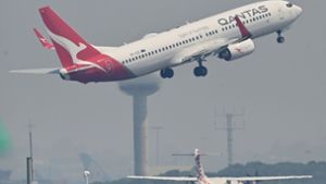 Qantas will eine Impfpflicht für Flugreisende einführen. Foto: AFP/PETER PARKS