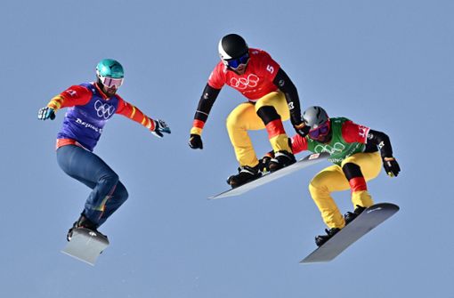 Martin Nörl (Mitte) verpasste eine Medaille bei den Olympischen Winterspielen. Foto: AFP/MARCO BERTORELLO