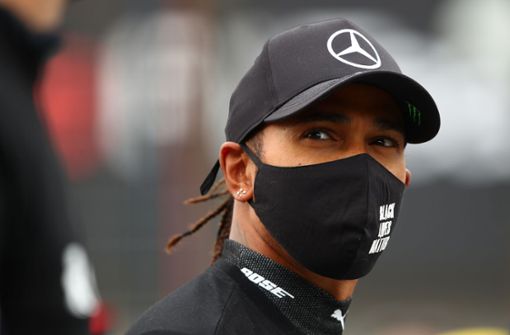 Der Brite Lewis Hamilton bleibt auch 2021 Rennfahrer  für Mercedes. (Archivbild) Foto: AFP/BRYN LENNON